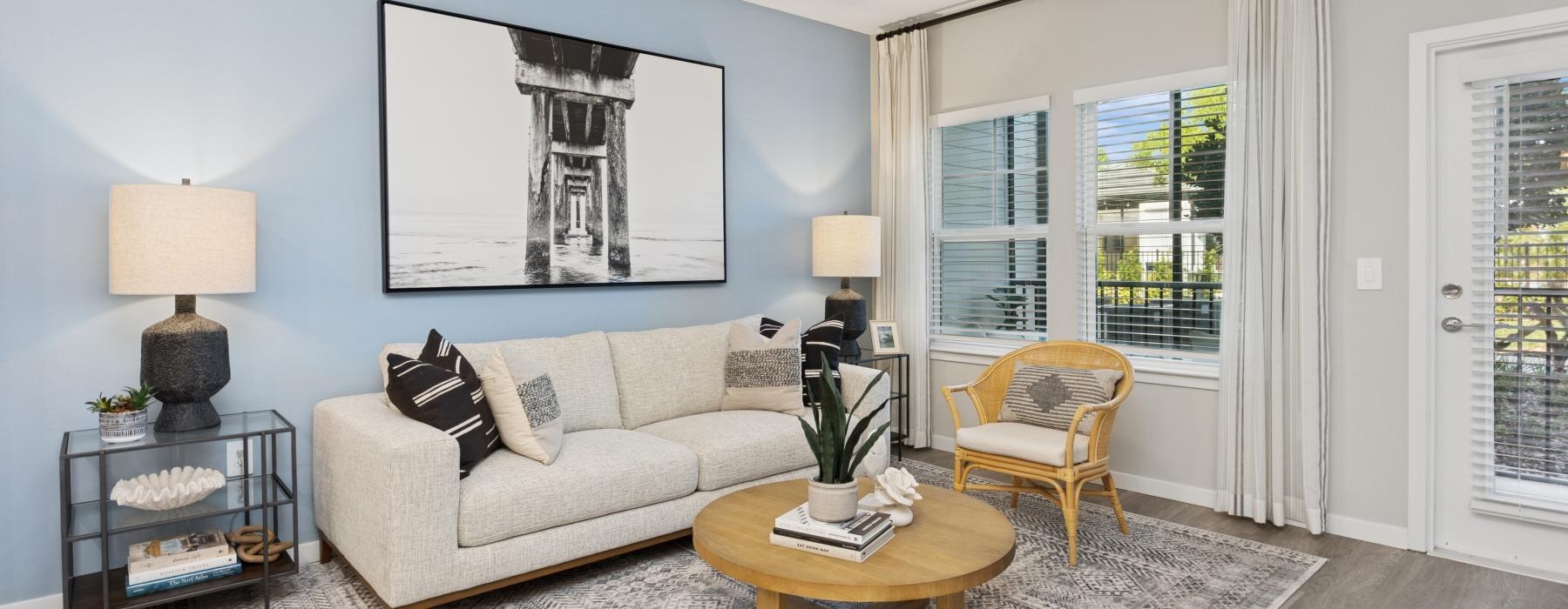 a living room with a couch and a table
